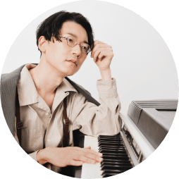 Kan Sano 顔写真